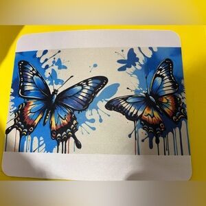 Blue butterflies mouse pad